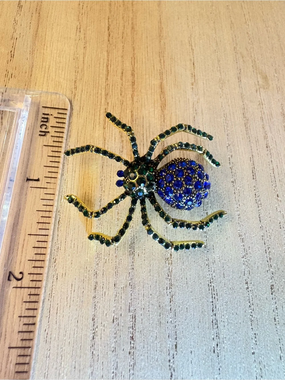 Gold-tone Spider Brooch with Blue and Green Rhinestones